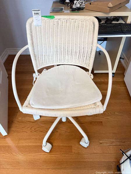 White wicker swivel desk chair with cushion | Maxsold