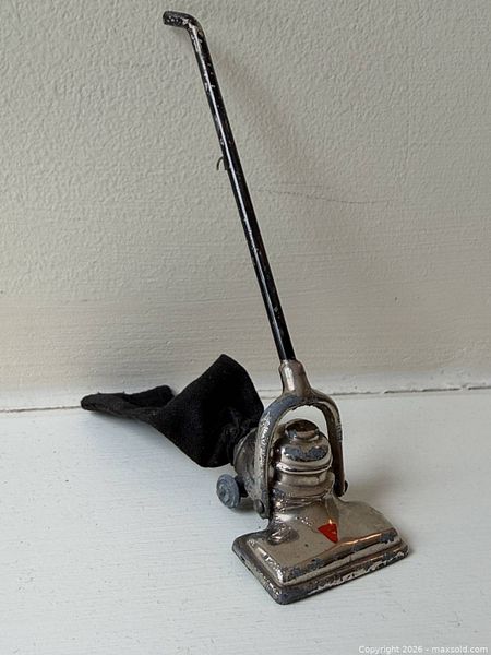 Antique miniature metal toy vacuum | Maxsold